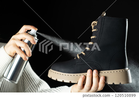 The process of applying a water-repellent protective agent from a spray can to a boot 120510899