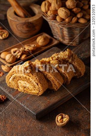 Cake with brown sugar, walnuts, and cream. Cake with brown sugar, walnuts, and cream. 120510953