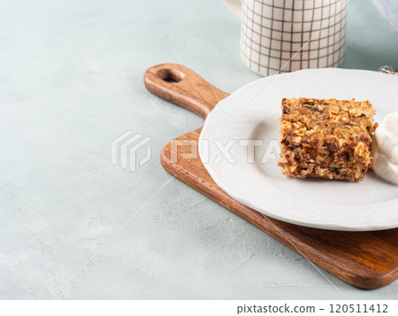 Baked oatmeal peanut butter porridge with chocolate chips Baked oatmeal peanut butter porridge with chocolate chips 120511412