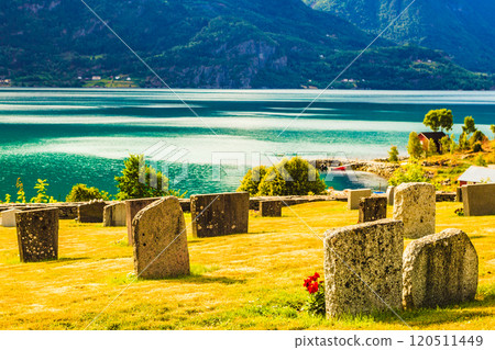 Churchyard in Nes village at fjord, Norway 120511449