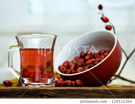 Rosehip tea tea full of vitamins and bowl with dried rosehips. Rosehip tea tea full of vitamins and bowl with dried rosehips. 120512264