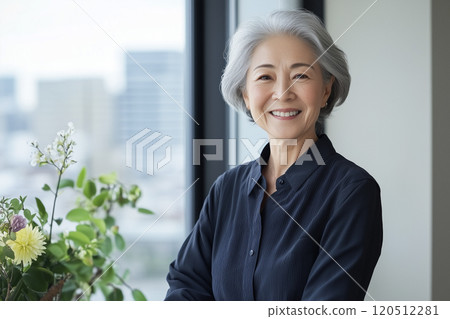 AI-generated image: Portrait of a smiling middle-aged woman with gray hair 120512281