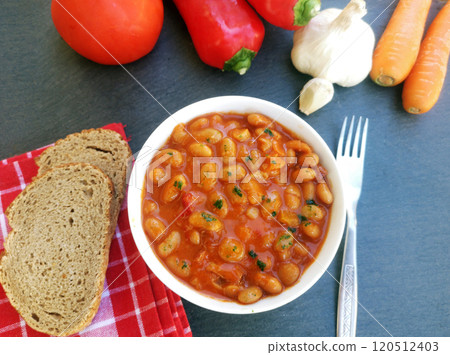 Tasty baked beans on tomato sauce Tasty baked beans on tomato sauce 120512403