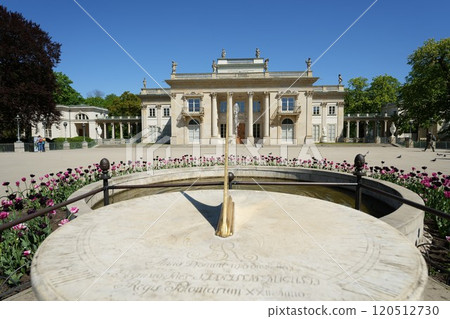 Sundial and fountain in front of palace on isle in Warsaw city in Poland Sundial and fountain in front of palace on isle in Warsaw city in Poland 120512730