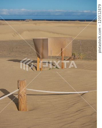 Special fence barriers for conservation ecosystem plants of dune in Maspalomas, Gran Canaria. Natural reserve to protect Traganum Moquinii plant, which helps to form dunes and regulate sand movement 120512879