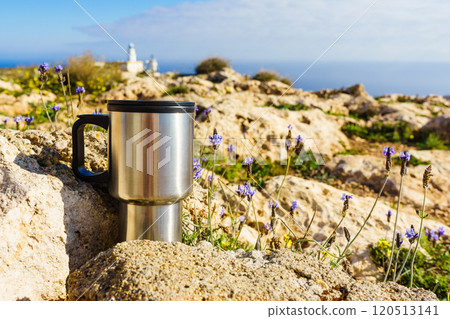 Thermal mug, thermos on nature. Travel outdoor picnic. 120513141