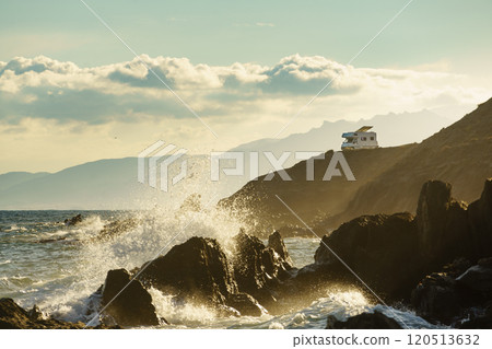 Seaside view with caravan camping on cliff 120513632