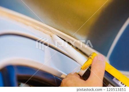Applying silicon on caravan body Applying silicon on caravan body 120513851