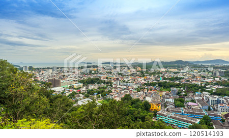 Aerial view of Phuket from Khao Rang hill, highlighting urban and natural scenery under a colorful evening sky. 120514193