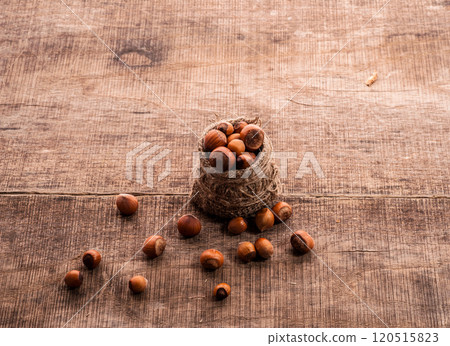 peeled nuts with shell on sacking 120515823