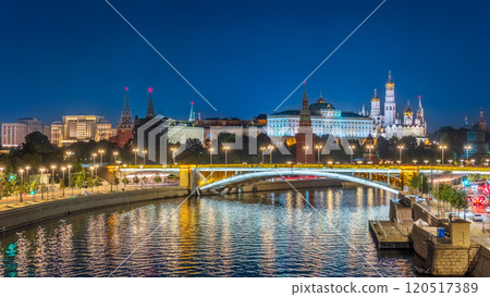 Illuminated Moscow Kremlin and Bolshoy Kamenny Bridge at summer night. View from the Patriarshy pedestrian Bridge Illuminated Moscow Kremlin and Bolshoy Kamenny Bridge at summer night. View from the Patriarshy pedestrian Bridge 120517389