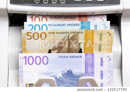 Norwegian crown in the counting machine Norwegian crown in the counting machine 120517795