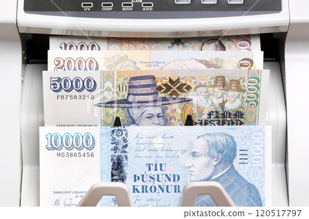 Icelandic money in a counting machine 120517797