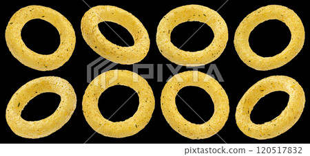 Crispy onion rings isolated on black background, package design element Crispy onion rings isolated on black background, package design element 120517832