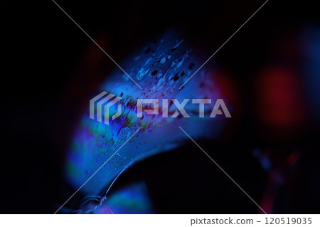 Bright blue structure on black background, oil stains movement, bright chemistry, surreal background 120519035
