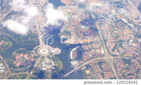 KUALA LUMPUR, MALAYSIA - APRIL 11, 2015: Aerial view from an aeroplane of a suburb of Kuala Lumpur KUALA LUMPUR, MALAYSIA - APRIL 11, 2015: Aerial view from an aeroplane of a suburb of Kuala Lumpur 120519342