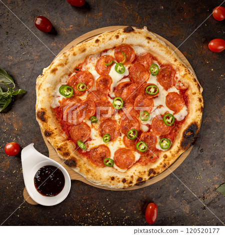 Round pepperoni pizza with melted mozzarella 120520177