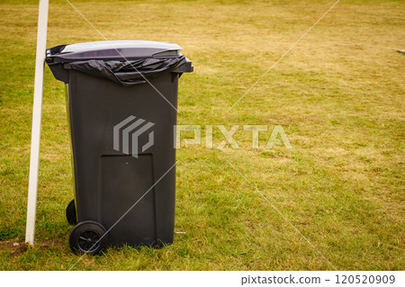 Recycle bin with plastic trash bag outdoor 120520909