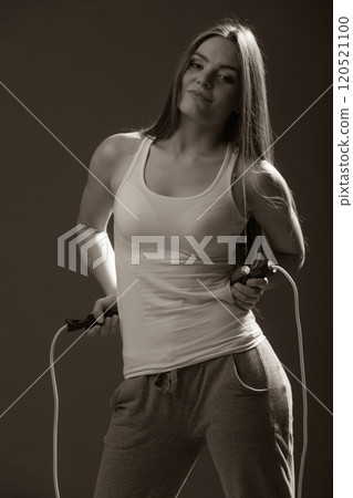 Fit woman with jumping rope Fit woman with jumping rope 120521100