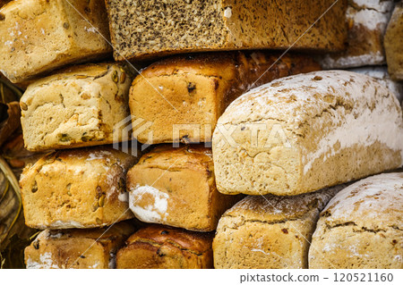 Many rustic fresh bread loaves 120521160