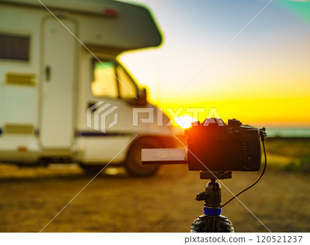 Caravan on beach at sunrise Caravan on beach at sunrise 120521237