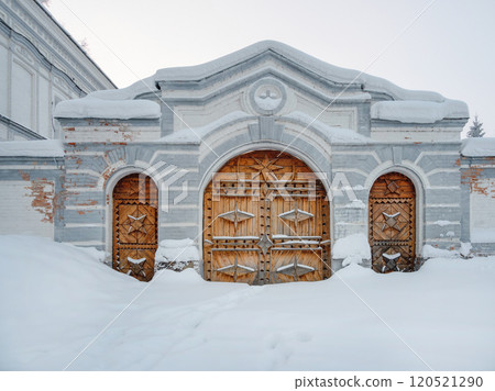 Old abandoned church with wooden carved gates Old abandoned church with wooden carved gates 120521290