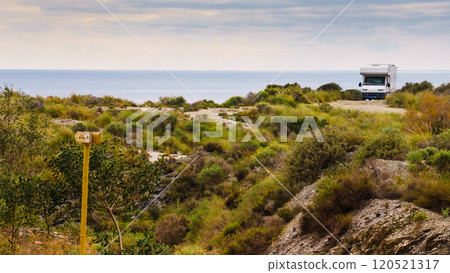 Camper on cliff, coast in Spain 120521317