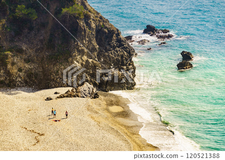 People on sandy beach sea shore 120521388