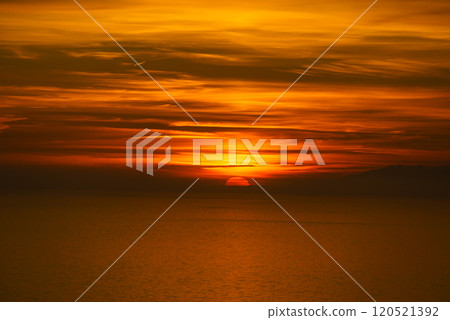 Sunset over sea 120521392