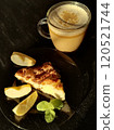 Сup of coffee tea on the table with a homemade cake decorated with a fresh mint 120521744
