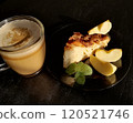 Сup of coffee tea on the table with a homemade cake decorated with a fresh mint 120521746