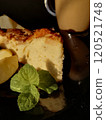 Сup of coffee tea on the table with a homemade cake decorated with a fresh mint 120521748