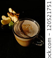 Сup of coffee tea on the table with a homemade cake decorated with a fresh mint 120521751