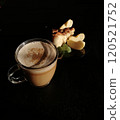 Сup of coffee tea on the table with a homemade cake decorated with a fresh mint 120521752