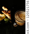 Сup of coffee tea on the table with a homemade cake decorated with a fresh mint 120521756
