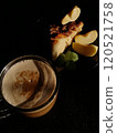 Сup of coffee tea on the table with a homemade cake decorated with a fresh mint 120521758