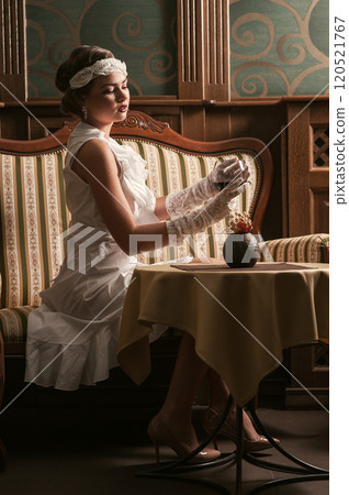 portrait of young female drinking red wine portrait of young female drinking red wine 120521767