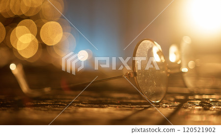 Santas Eyeglasses On Wooden Table In Front Of Christmas Tree 120521902