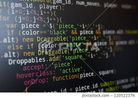 Colorful and complex JavaScript code displayed on a computer screen, highlighting various syntax elements. Focus on programming details and coding structure 120522376