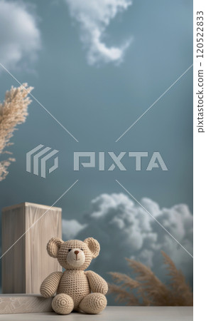 Vertical poster of a lonely bear made in amigurumi style against the sky with clouds, studio background with space for gift concept Vertical poster of a lonely bear made in amigurumi style against the sky with clouds, studio background with space for gift concept 120522833