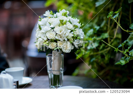 Wedding bouquet standing on the table Wedding bouquet standing on the table 120523094
