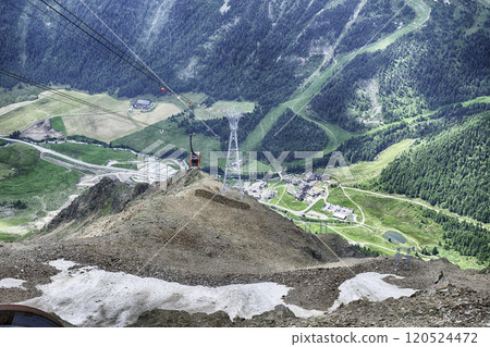 Ascending Schnalstal Glacier by cable car in the Italian Alps Ascending Schnalstal Glacier by cable car in the Italian Alps 120524472