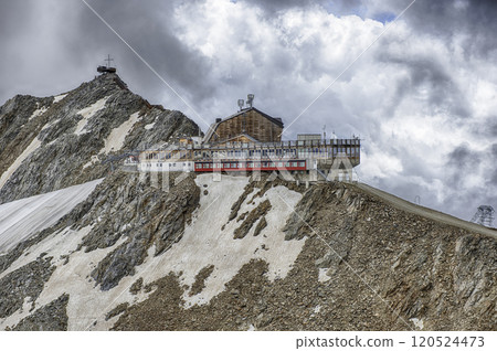 Restaurant perched on a mountain top in the Italian Alps 120524473