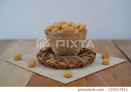 a traditional cake from Indonesia called kue sus filled with cream puffs a traditional cake from Indonesia called kue sus filled with cream puffs 120527851