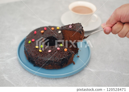 Chocolate cake on a table 120528471