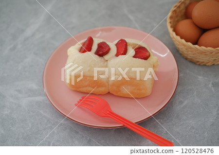 Strawberry cheese cake on a table. Strawberry cheese cake on a table. 120528476
