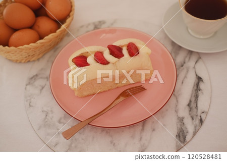 Strawberry cheese cake on a table. 120528481