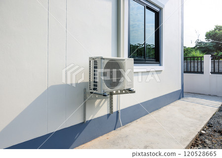 Condenser unit outside home. Condenser unit outside home. 120528665