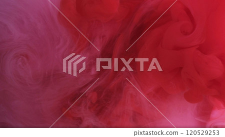 Sprinkling smoke. Draw underwater. Defocused glittering red white contrasts pigment swirling ink on modern art abstract background. 120529253