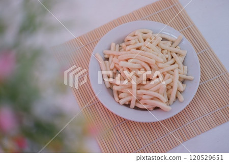 delicious onion flavored snack in white plate delicious onion flavored snack in white plate 120529651